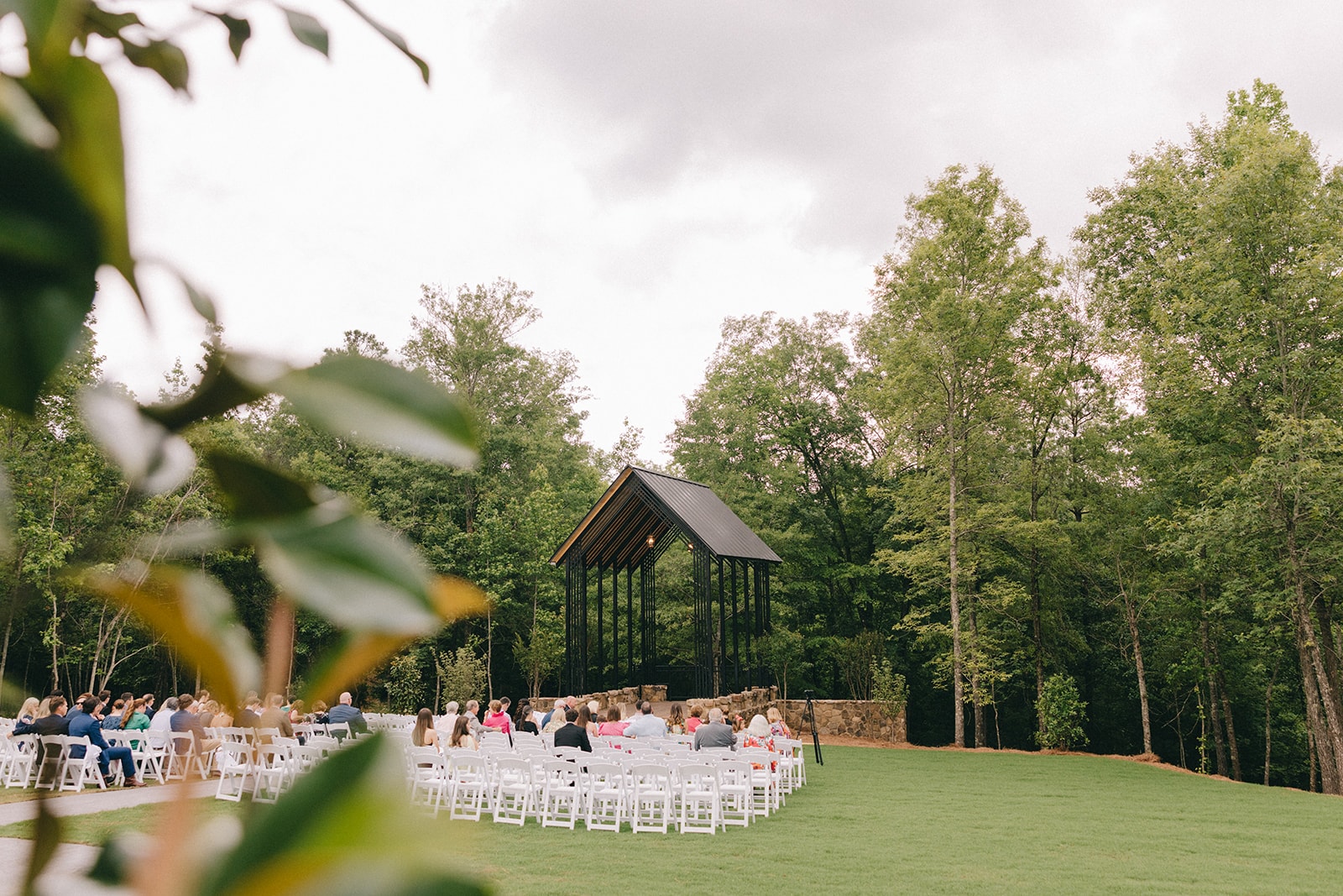 Couple sharing a kiss during sparkler send-off at The Vineyard at Mountain Springs